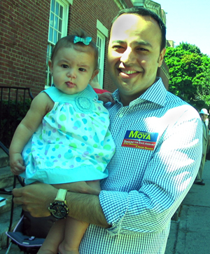 NY Assembly Candidate Francisco Moya, holding his niece - Photo: Cristina DC Pastor