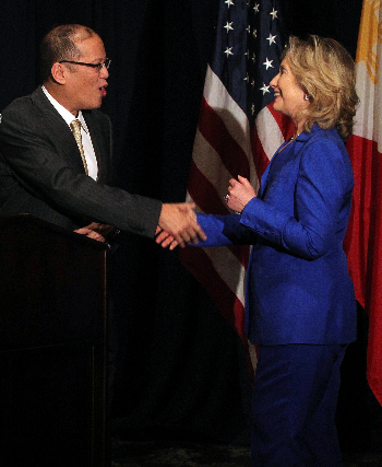 President of the Philippines Benigno Simeon  Aquino III greets US Secretary of State Hillary Rodham Clinton