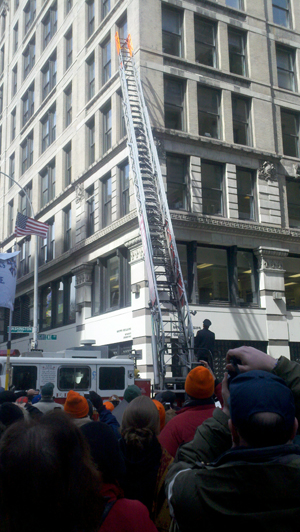 The ceremony included a reenactment of the fire department ladders only reaching the sixth floor of the burning factory building