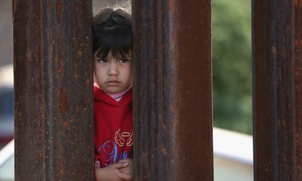 child on Mexican side of border