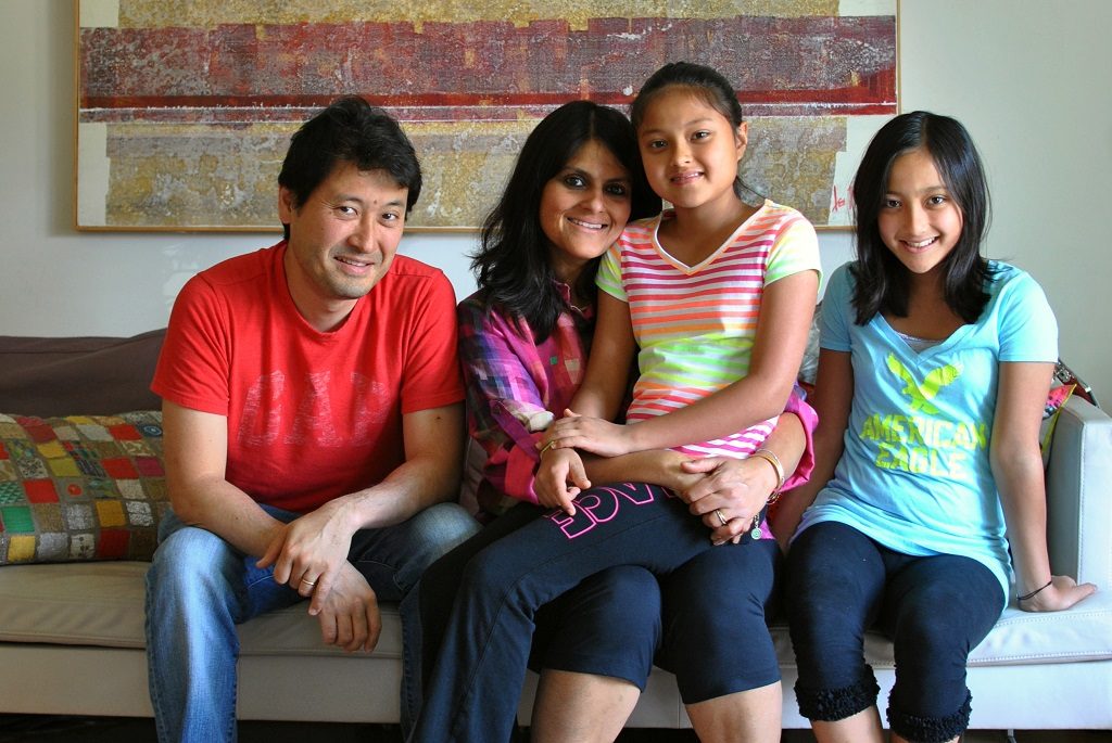 Yozo and Malini Sood Horiuchi, with daughters