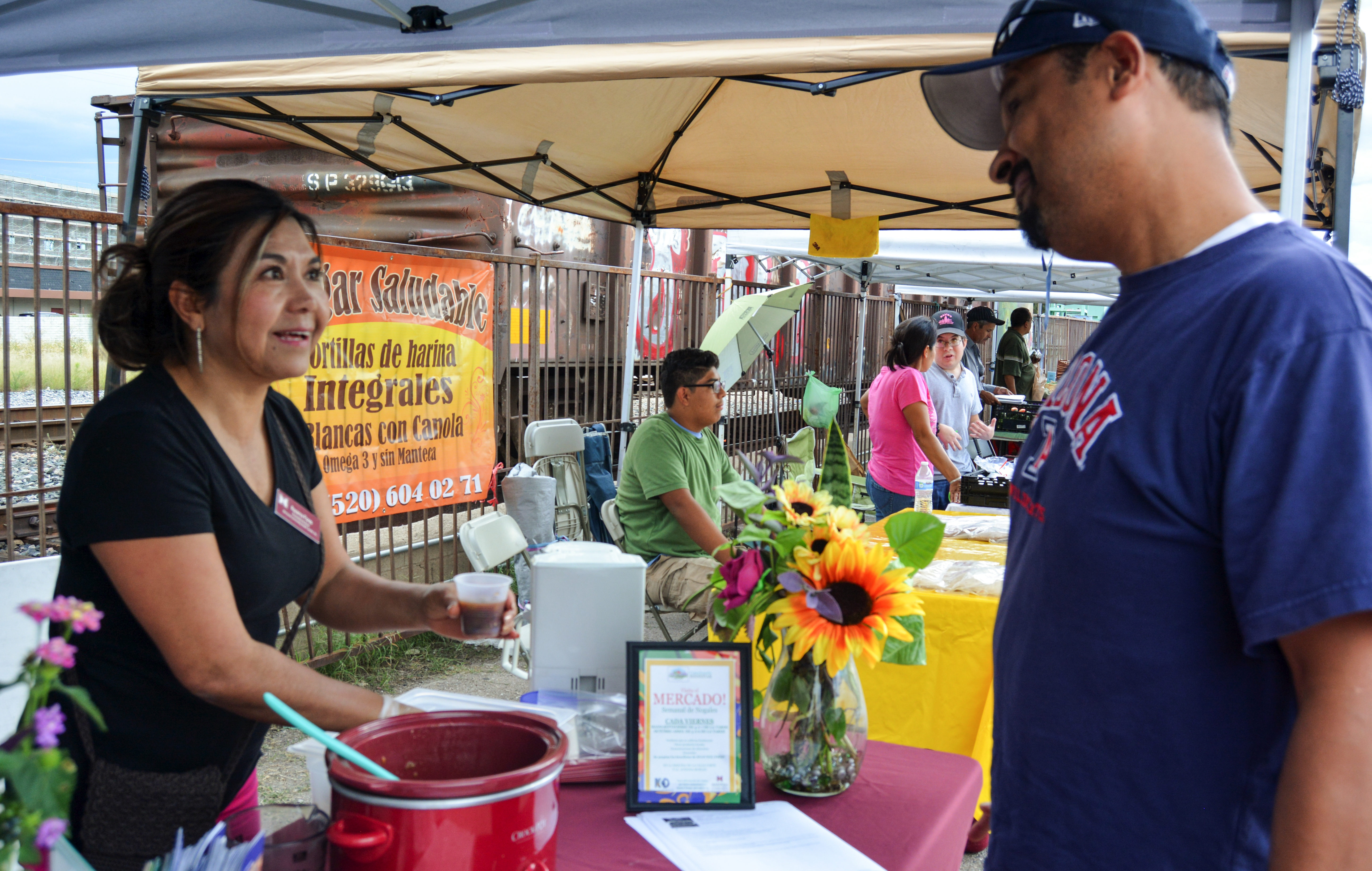 In Arizona, A Farmers’ Market Flourishes In the Shadow of the Border Fence